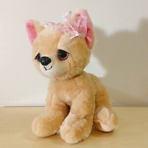 Plush Chihuahua dog with bow by The Petting Zoo